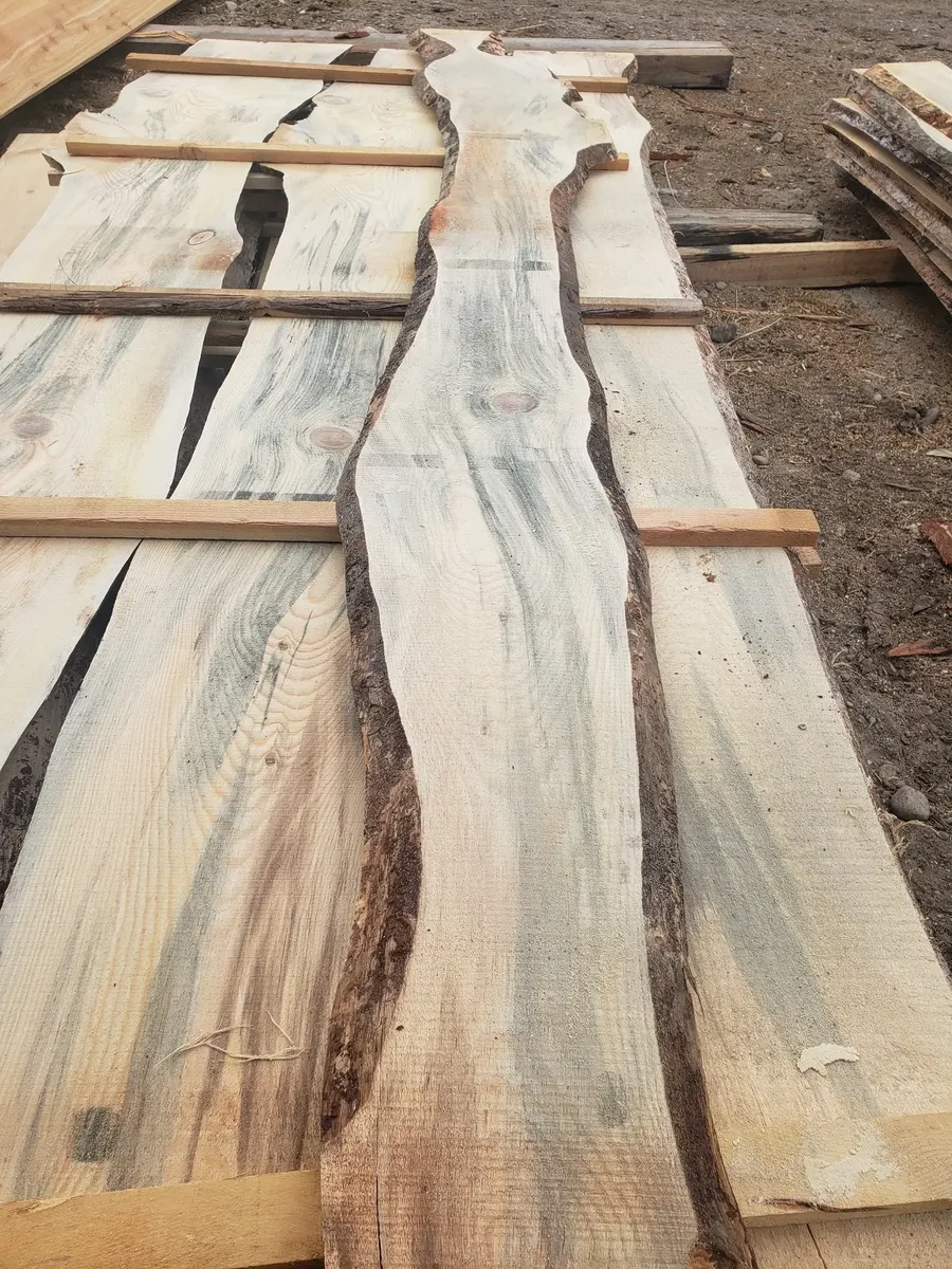 Rough boards showing live edges and natural character