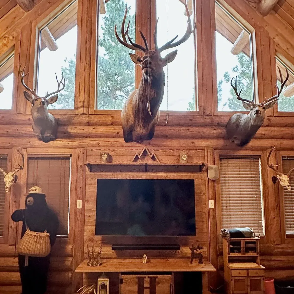 Wood mantel and shelf detail in a finished log-home interior